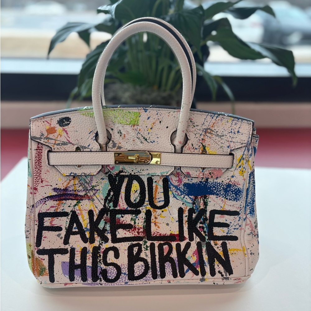 Sonique Saturday hand painted bag.